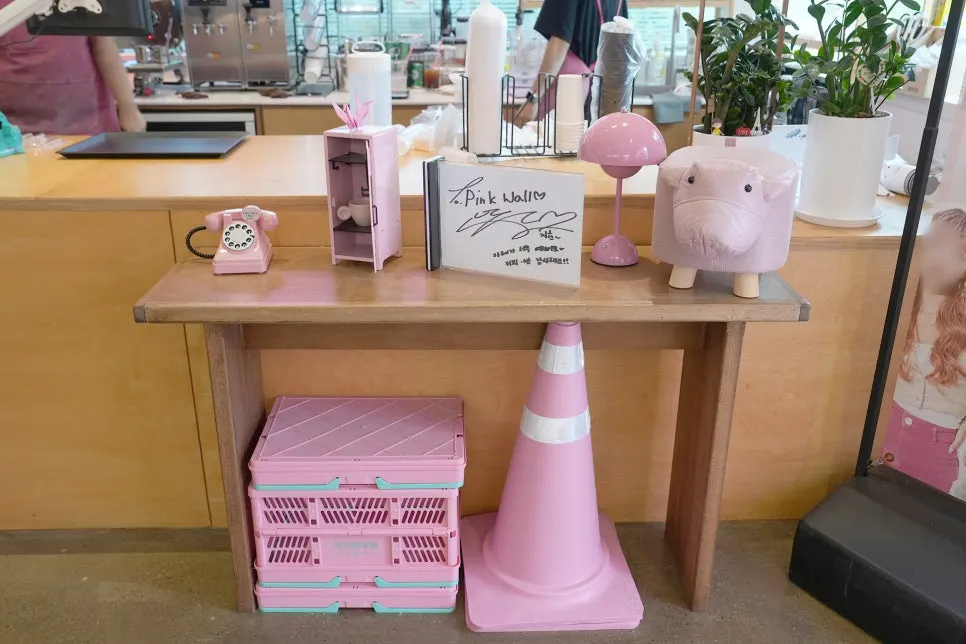 Pink props at Pink Wall Cafe, right down to the pink tissues