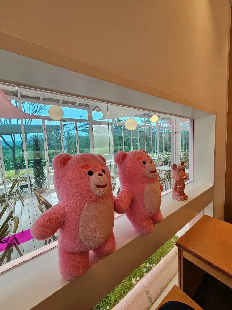 Large indoor hall tables at Pink Wall Cafe