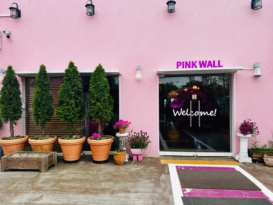Pink exterior of Pink Wall Cafe