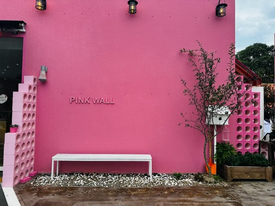 Pink photo zone at the café entrance