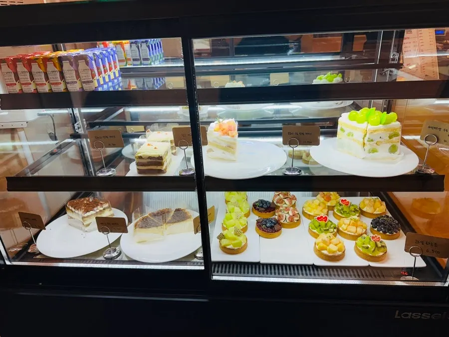 Bakery display case in front of the counter