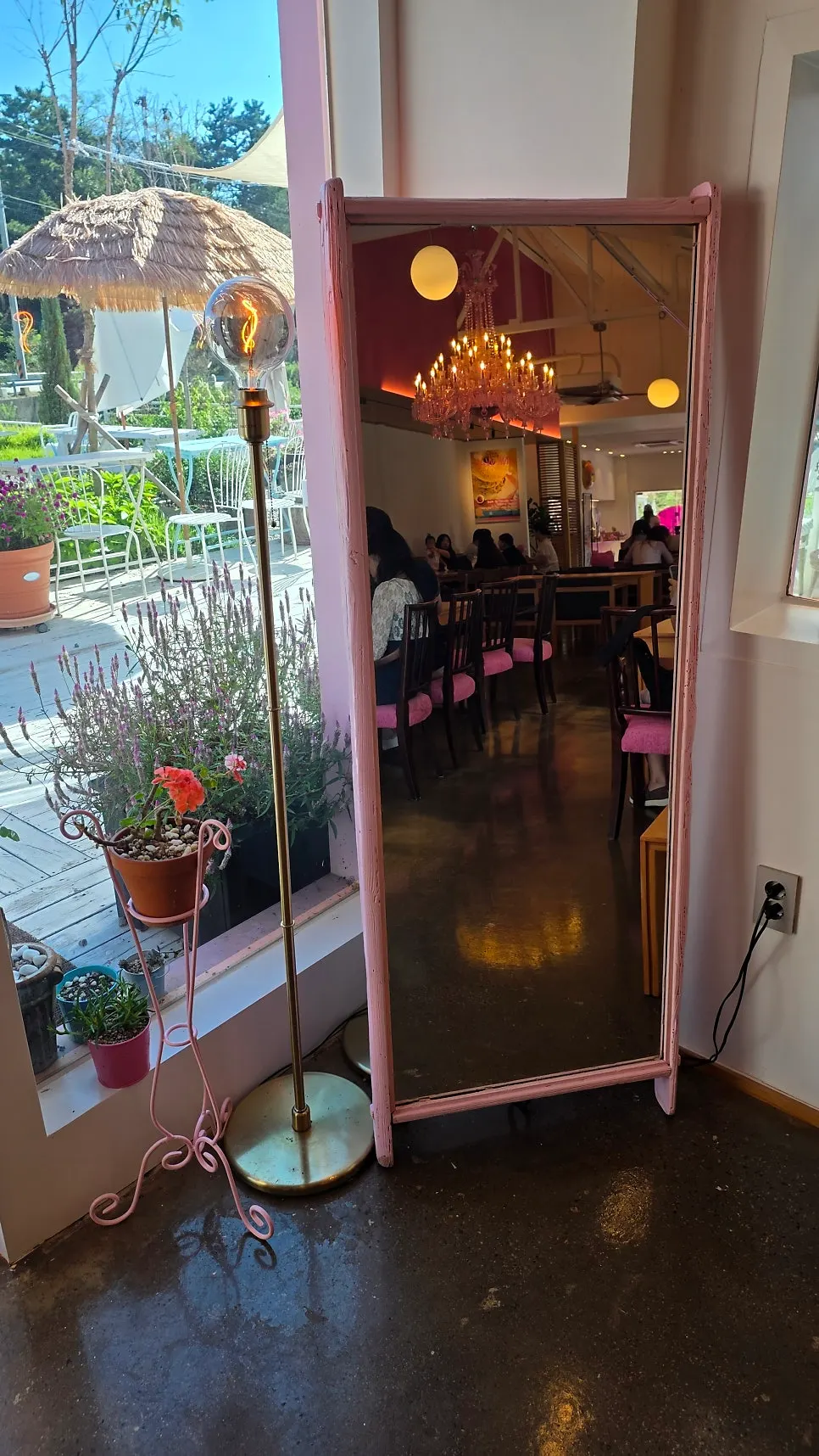 Photo zone inside Pink Wall Cafe