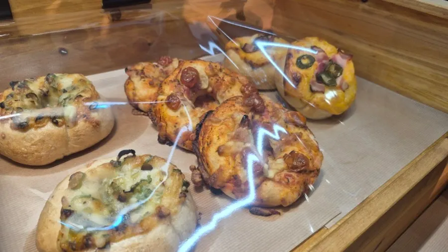 Bagels and desserts on display at Pink Wall Cafe