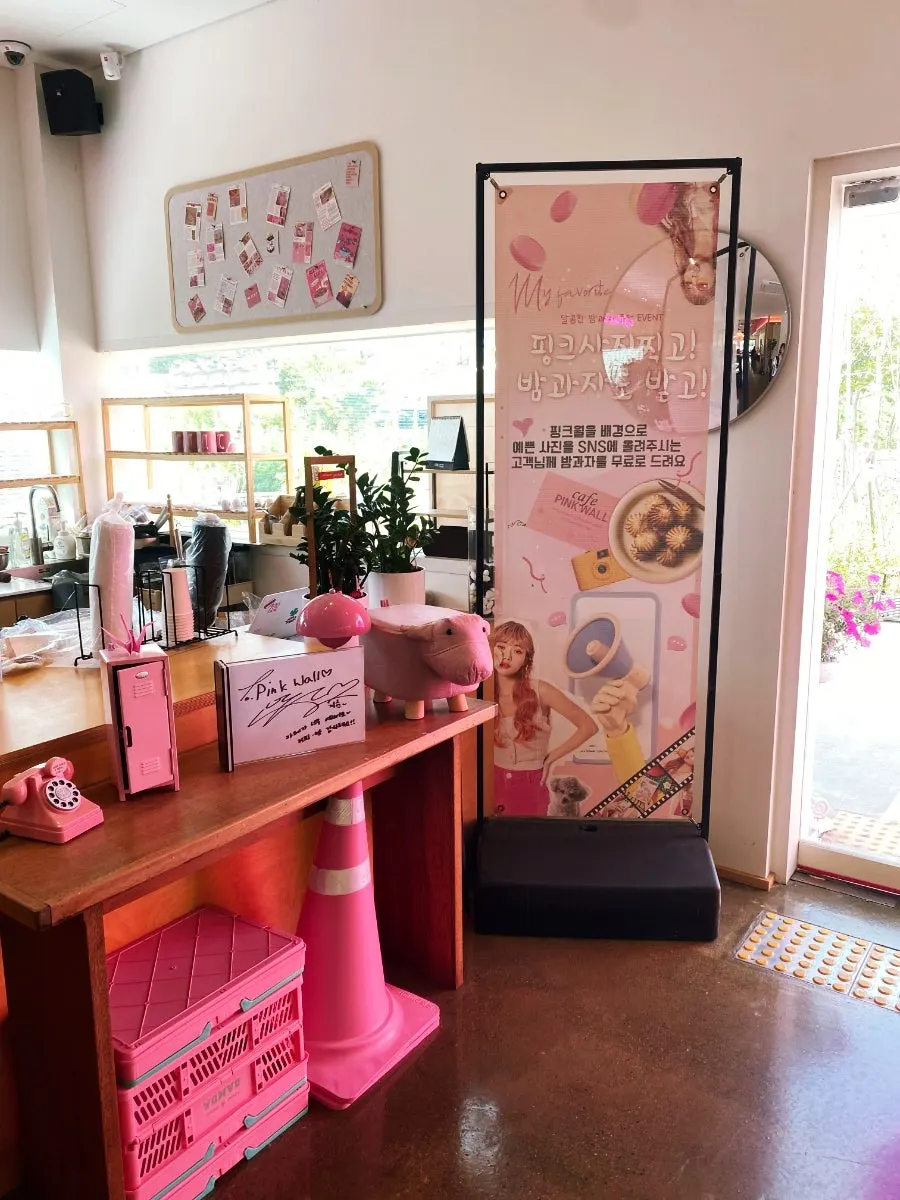 Display of bagels and bakery items at Pink Wall Cafe