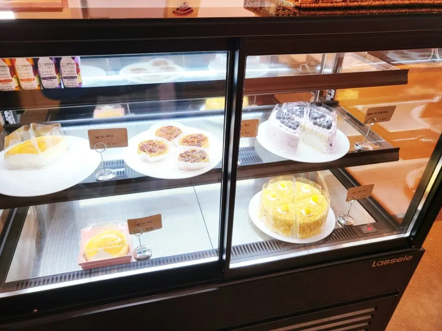Americano and bakery order at Pink Wall Cafe