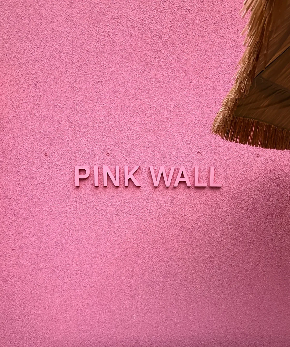 Pink Wall Cafe building with its eye-catching pink exterior