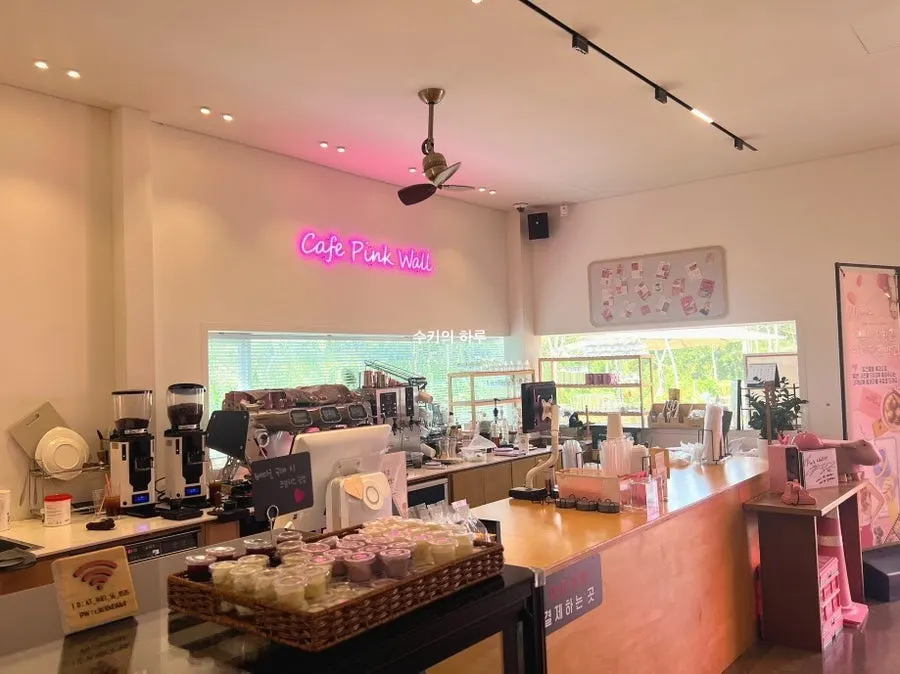 Final exterior view of Pink Wall Cafe