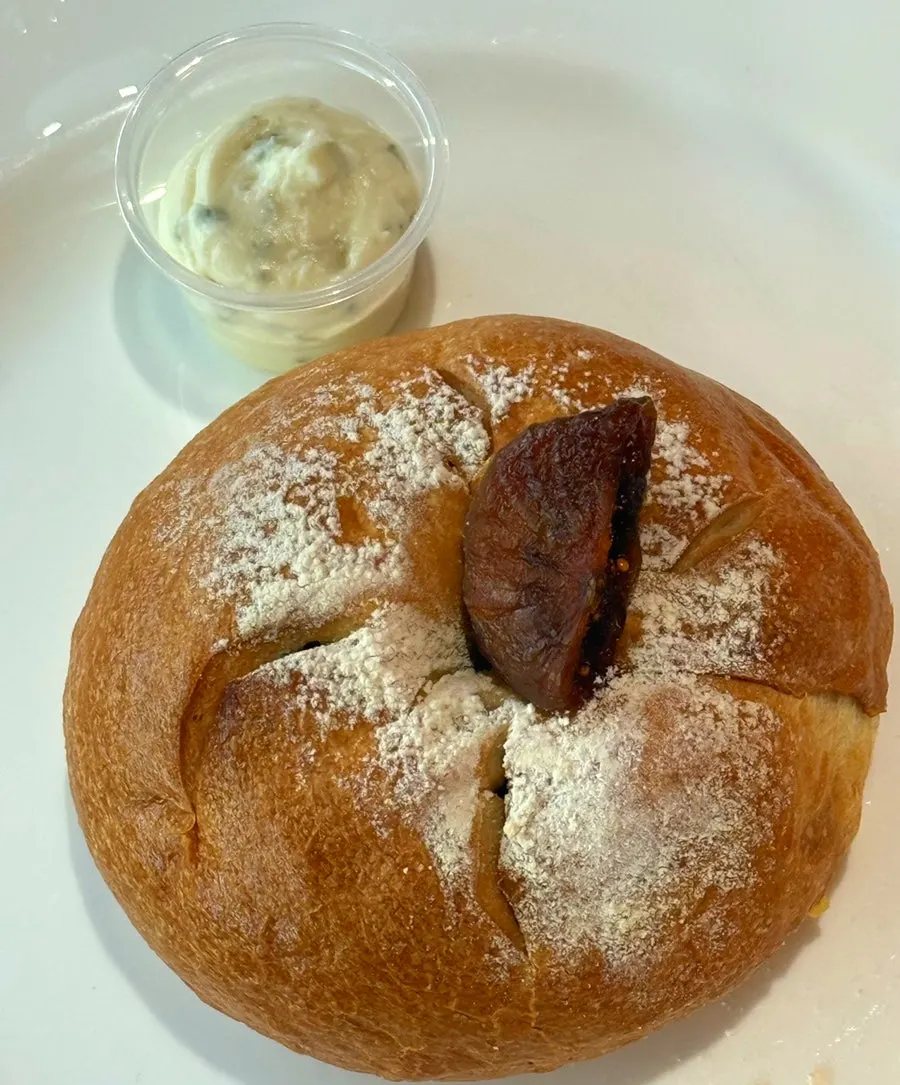 Fig bagel topped with fresh fig at Pink Wall Cafe