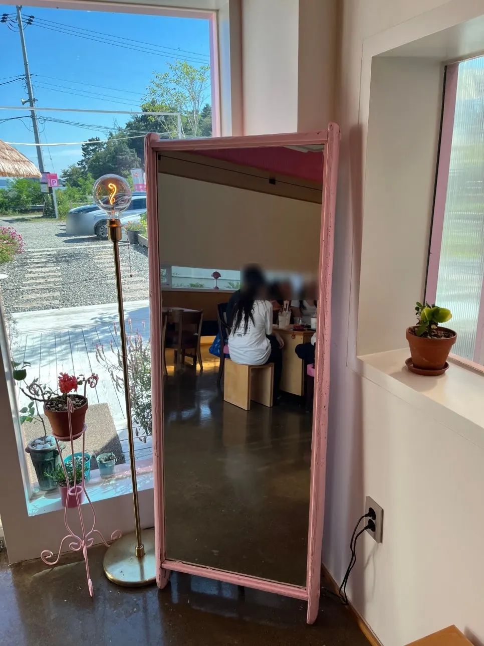 Large mirror with a pink frame