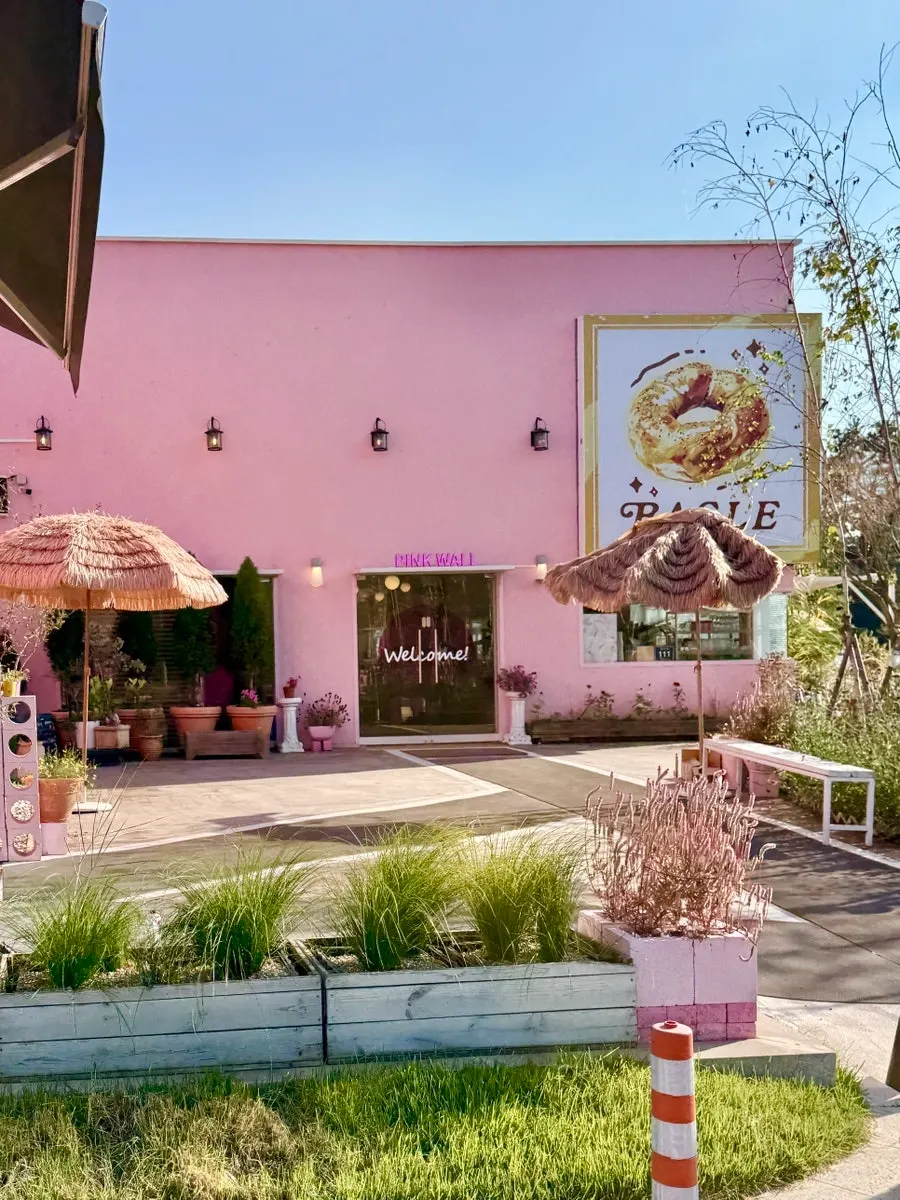 Full pink exterior view of Pink Wall Cafe