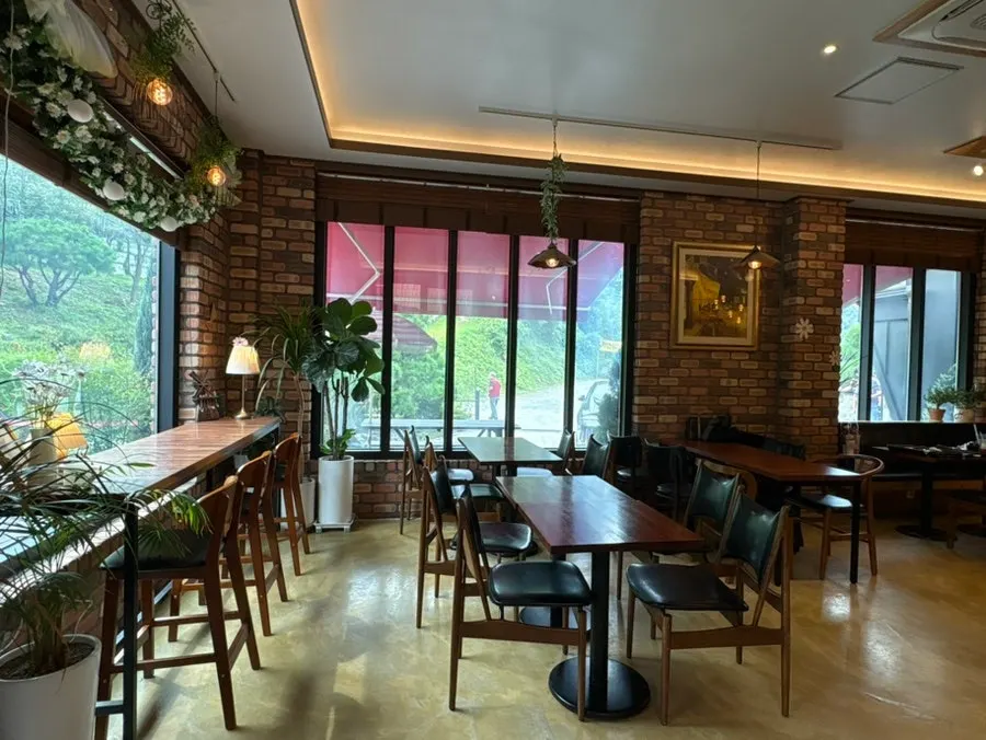 Seating inside Pino Cafe's main building