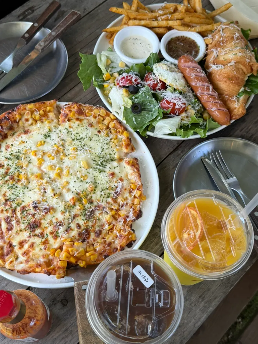 Brunch spread laid out on the wooden bench