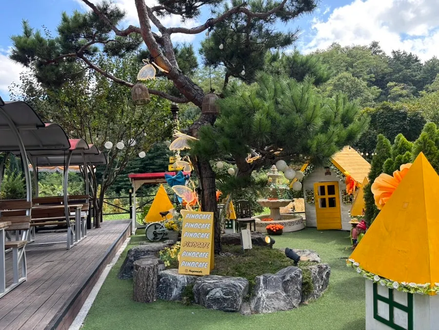 Pino Cafe's spacious parking lot and main entrance