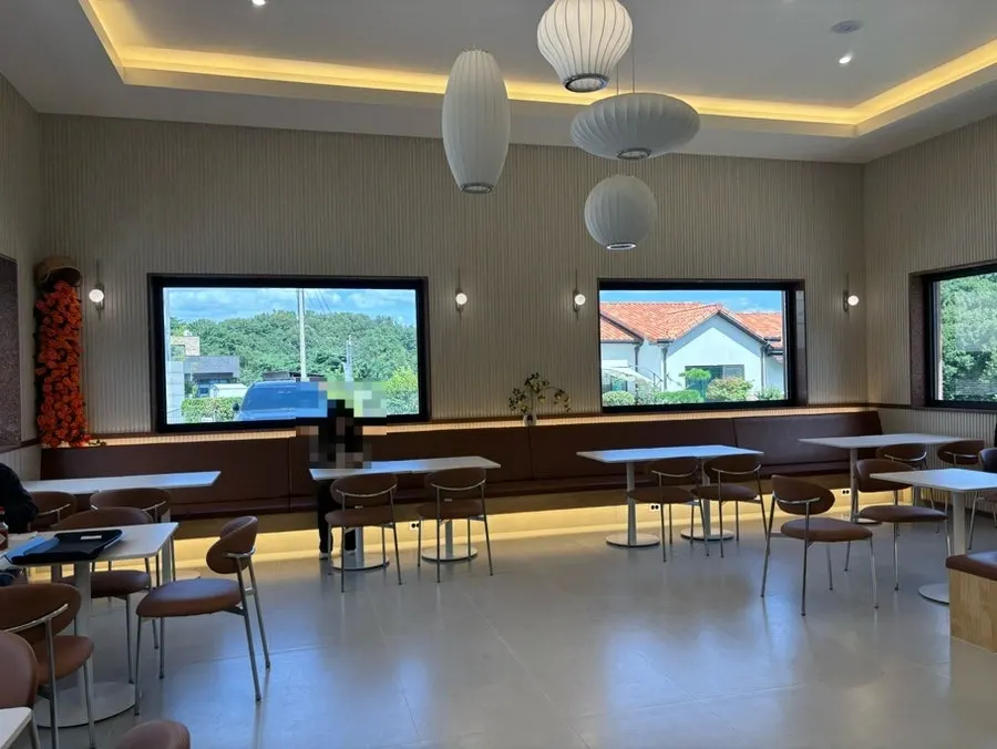 Atmospheric seating inside Pino Cafe's main building