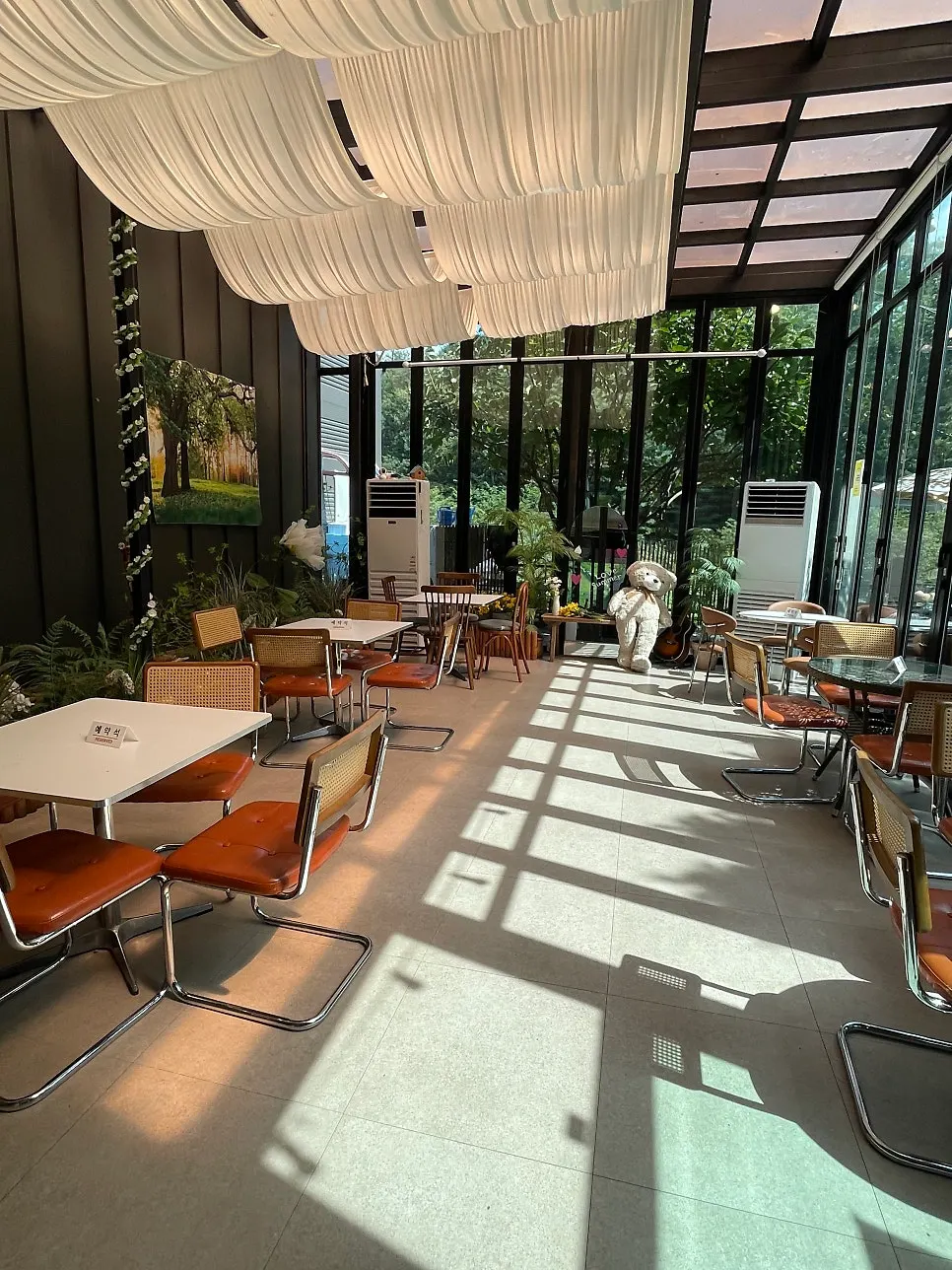 Indoor seating at Pino Cafe suited for family groups