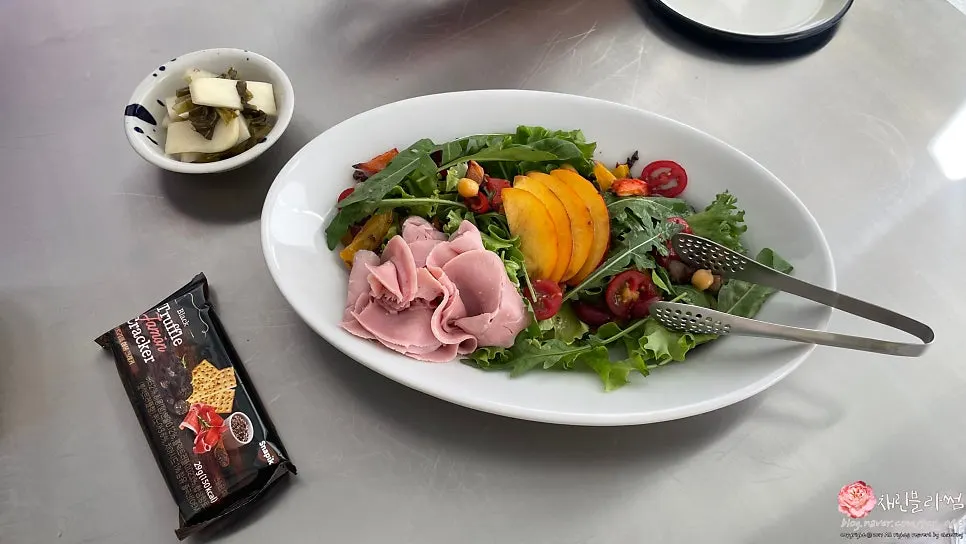 Plate of Pinoli Salad with jambon ham and crackers