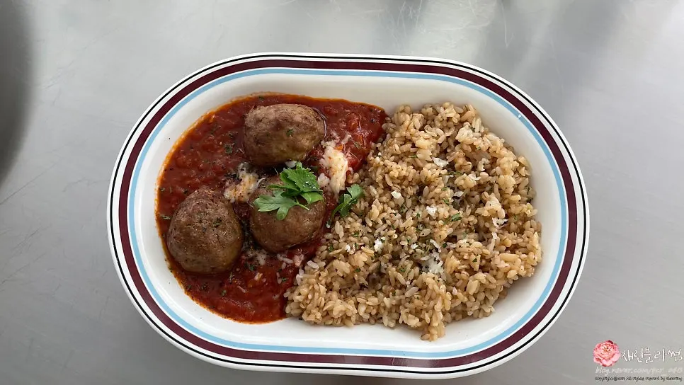 Polpette con Riso Saltato, garlic fried rice topped with house-made meatballs