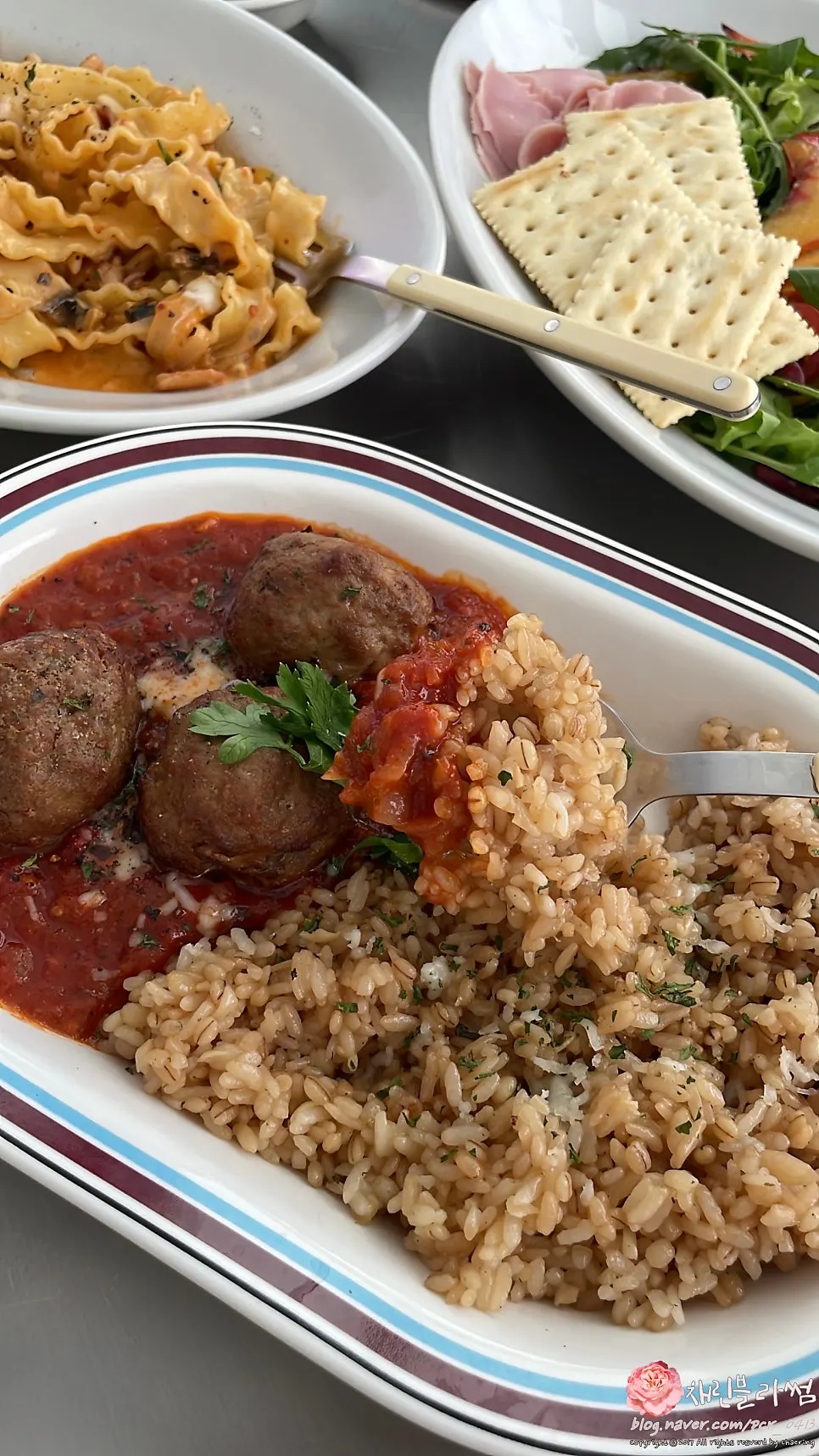 Close-up of buttery garlic fried rice with meatballs