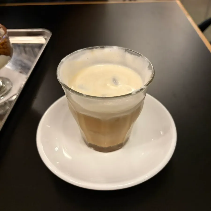 Signature Pip Coffee topped with cream