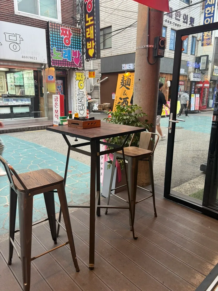 Outdoor seating and the area near the entrance