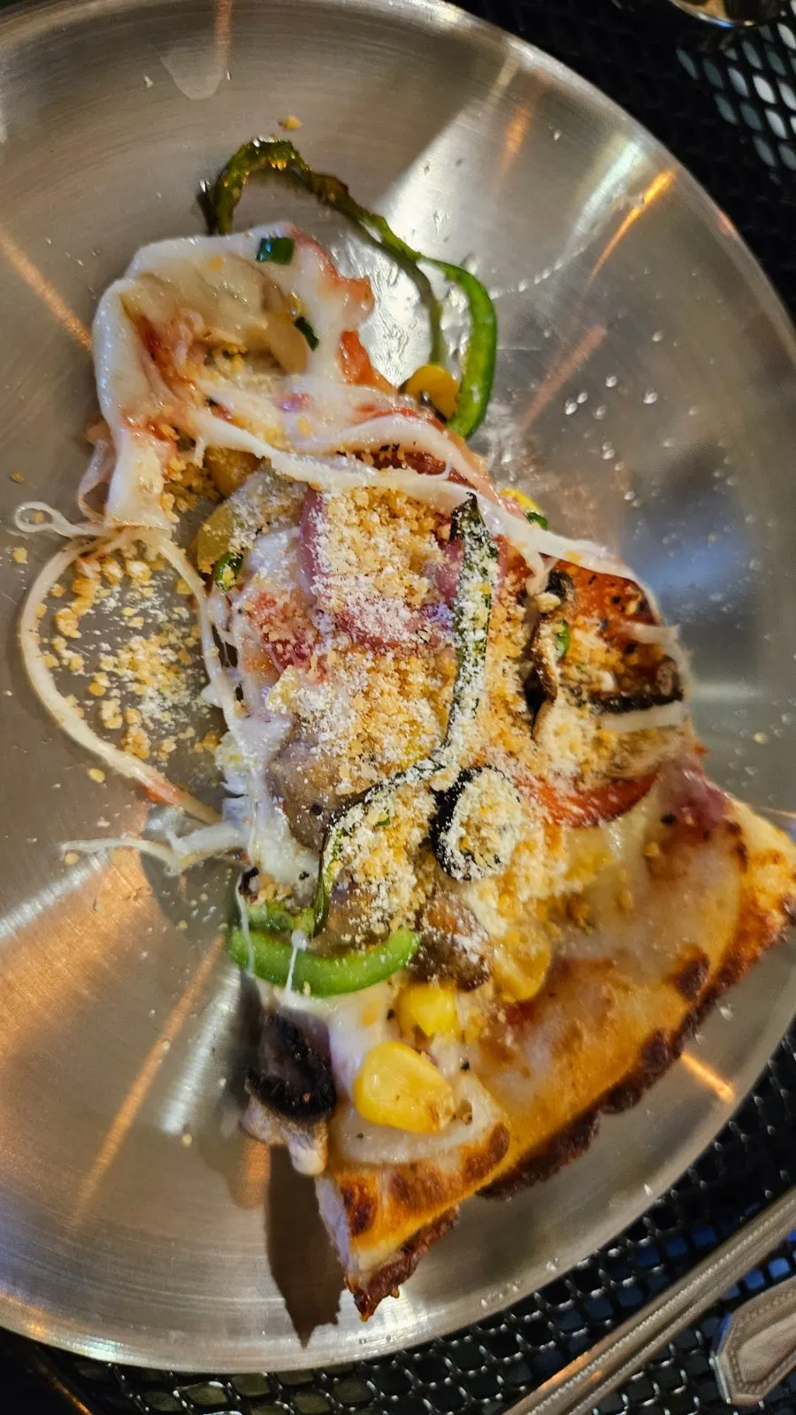 Table spread with pizza and zero-sugar cider