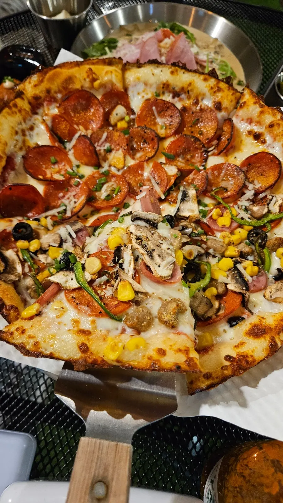 Half-and-half pizza with pepperoni and combination toppings