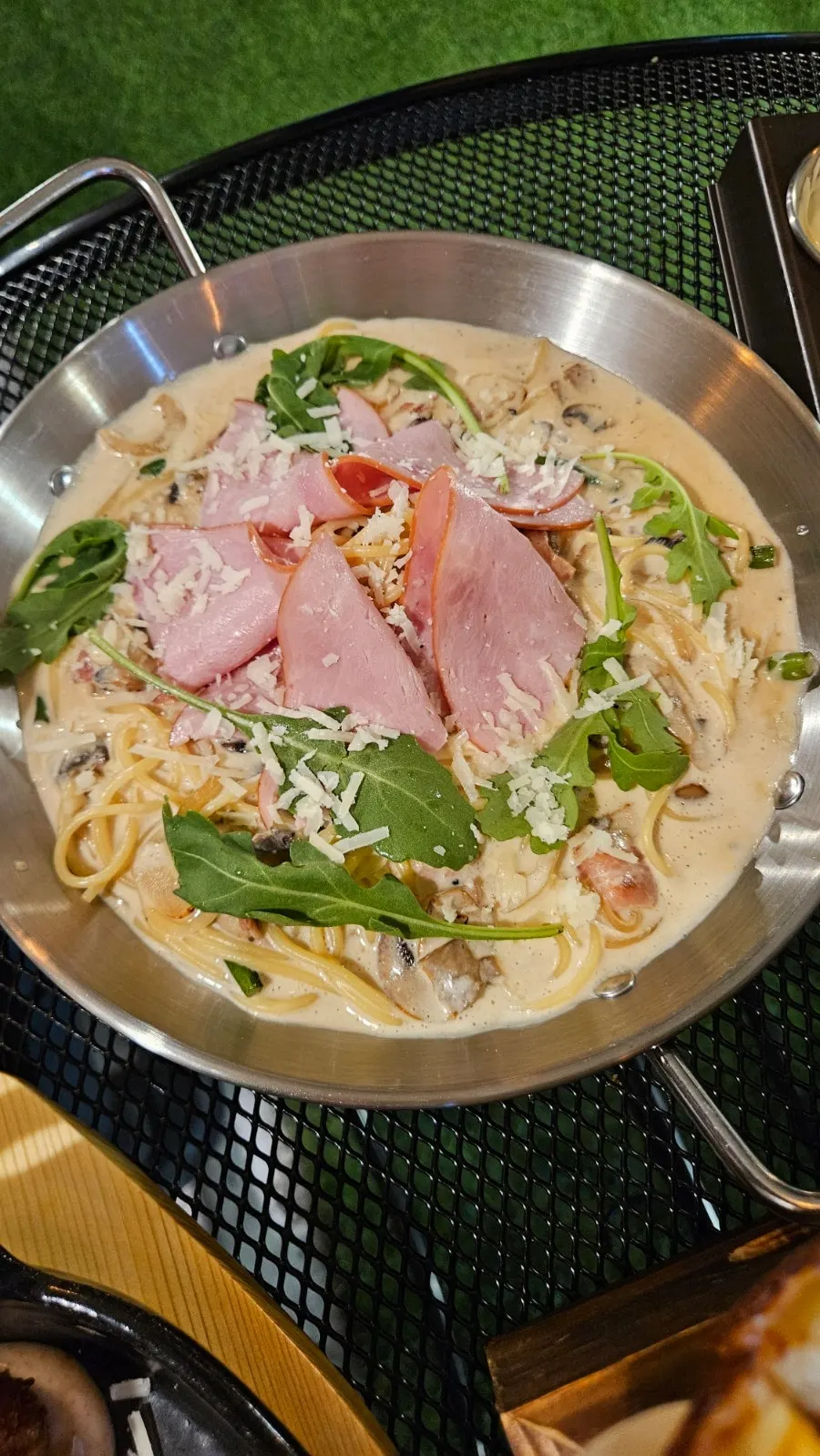 Plate of cream pasta scraped clean of sauce