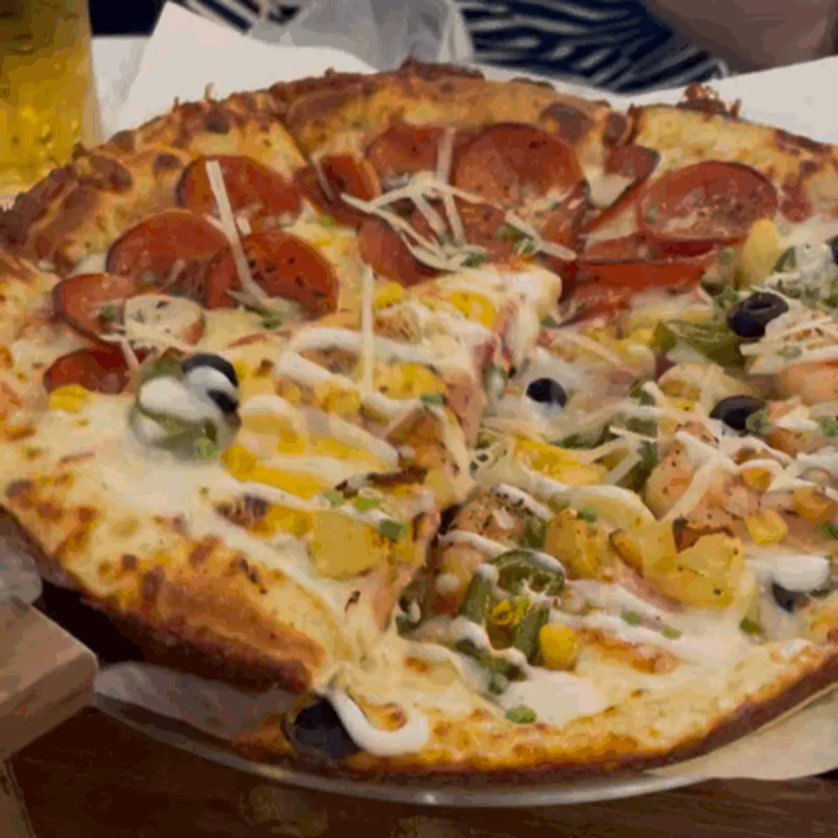 Half-and-half pizza at Pizza E Michida Konkuk Branch, main photo