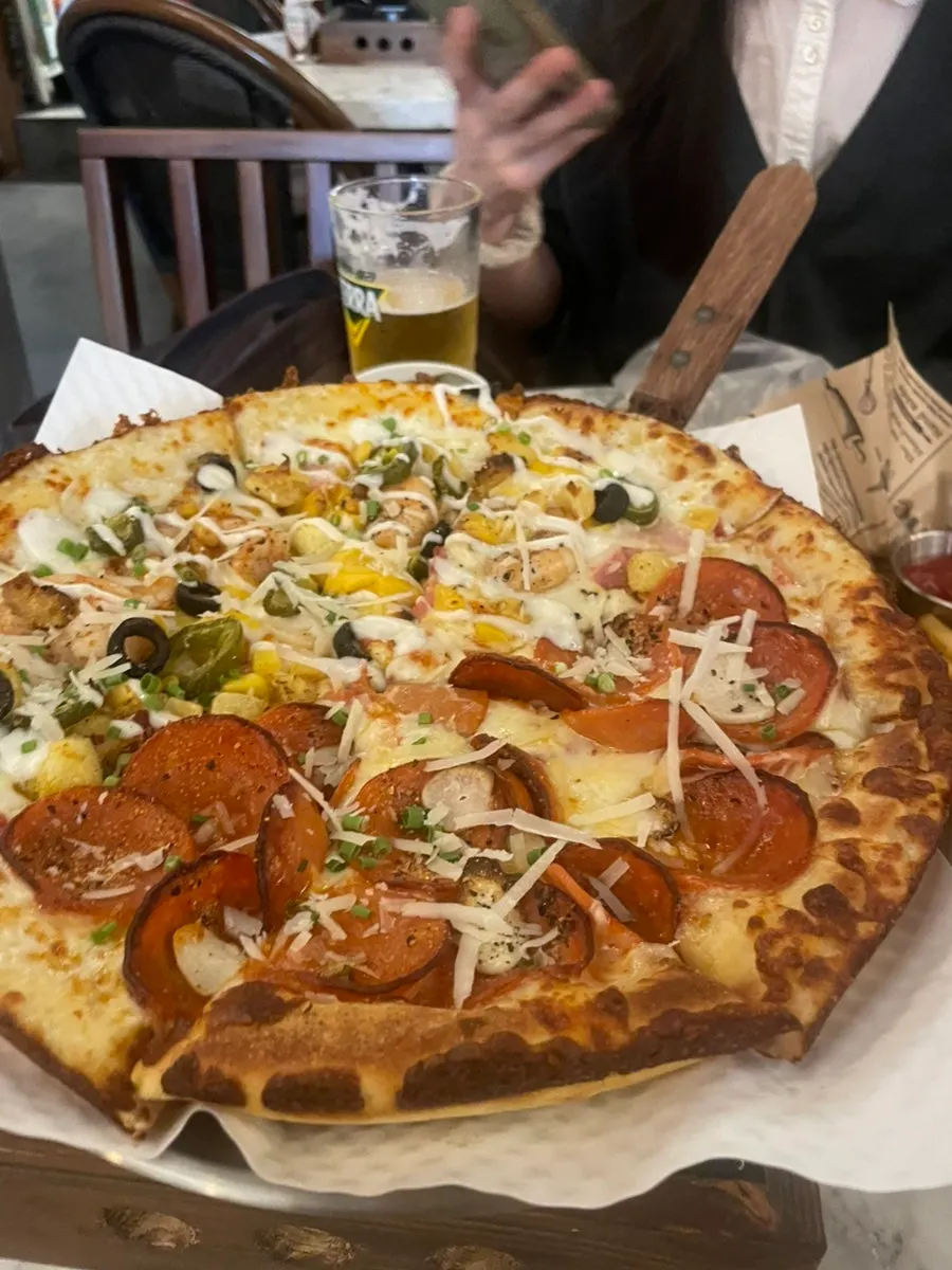 Half-and-half pizza placed on the table
