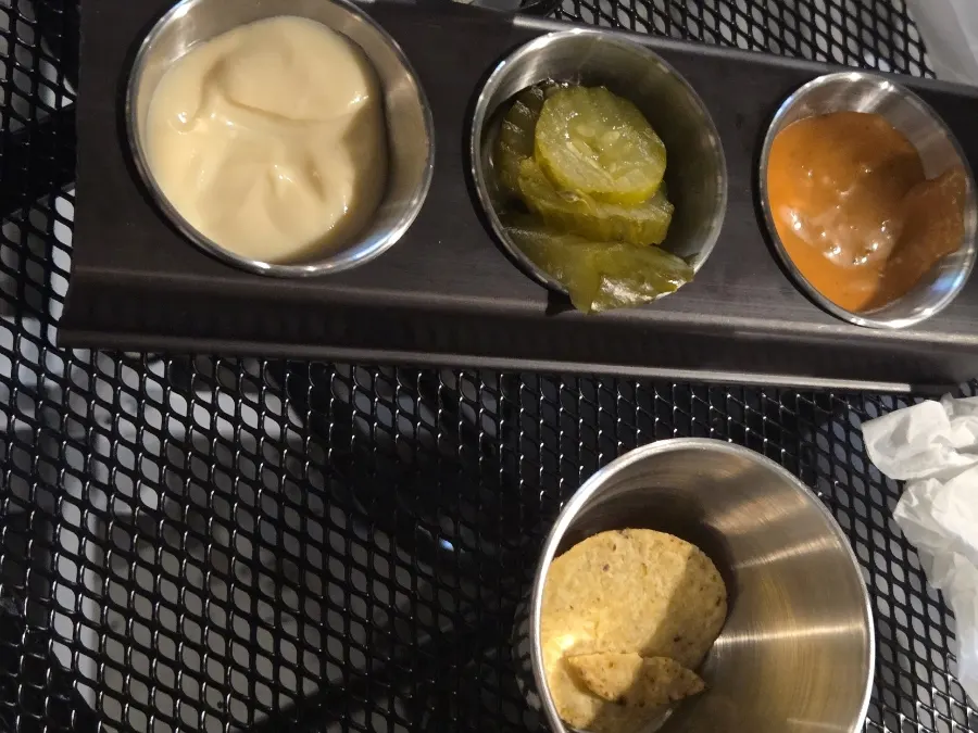 Complimentary nachos and sauce