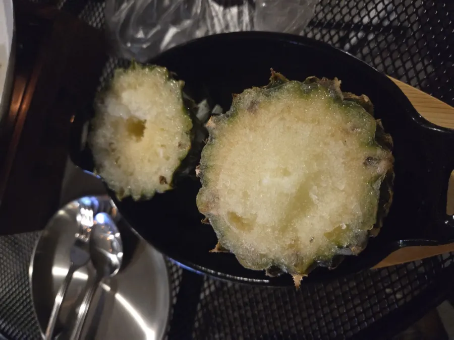 Pineapple sorbet served in a pineapple shell