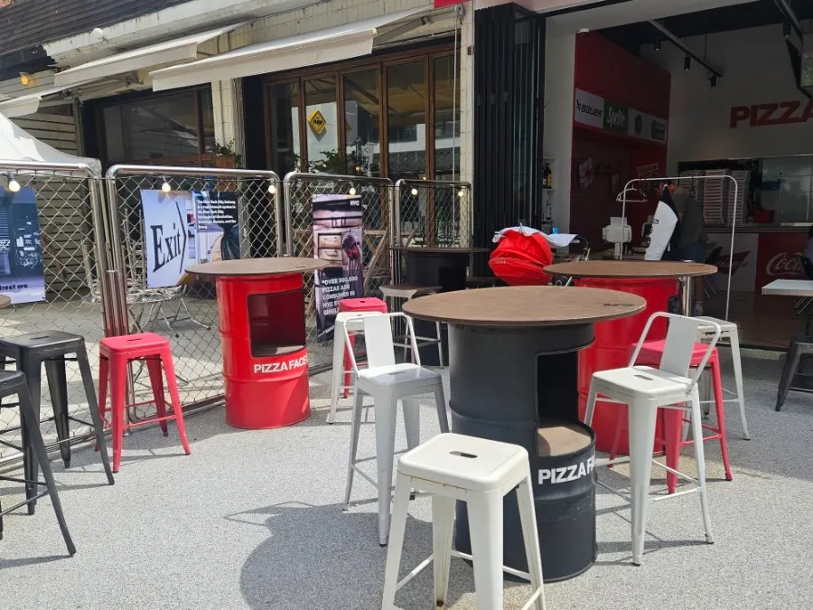 Wide outdoor patio table space in front of the restaurant