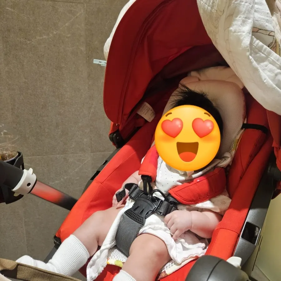 Baby waking up with a slice of pizza