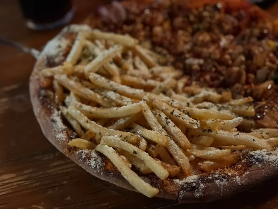 Potato pizza piled high with fries