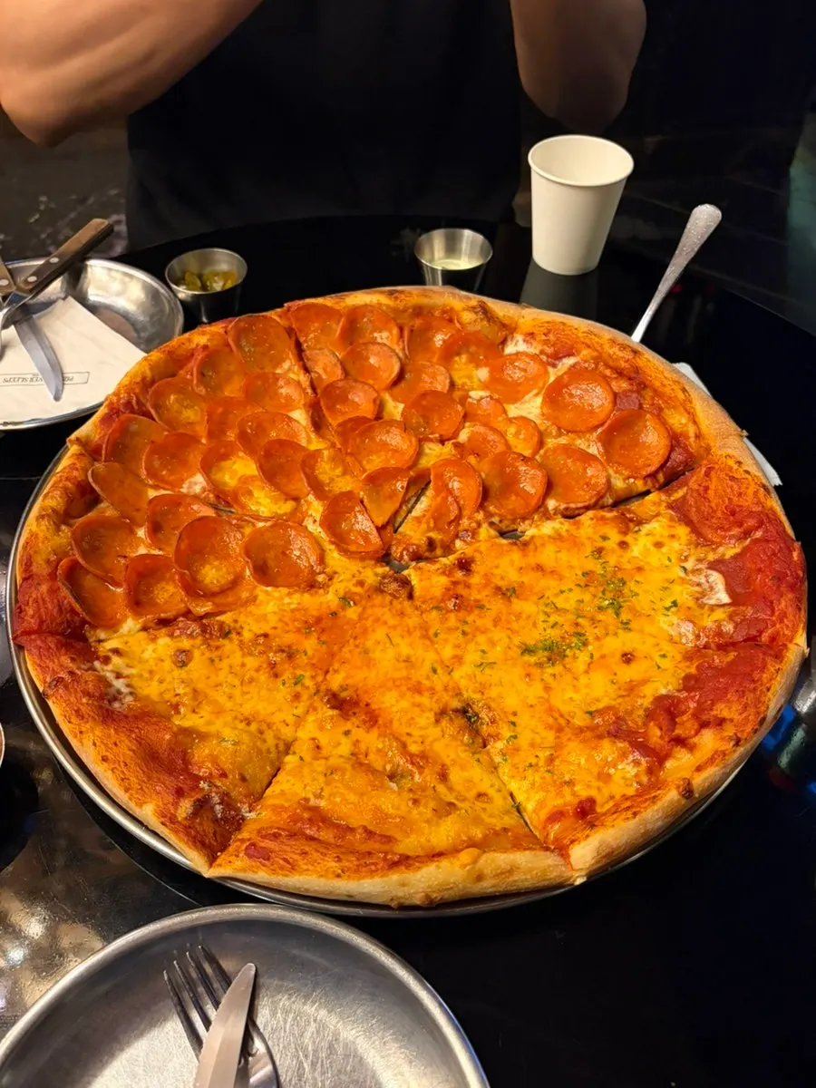 Cross-section of crispy wood-fired pizza crust