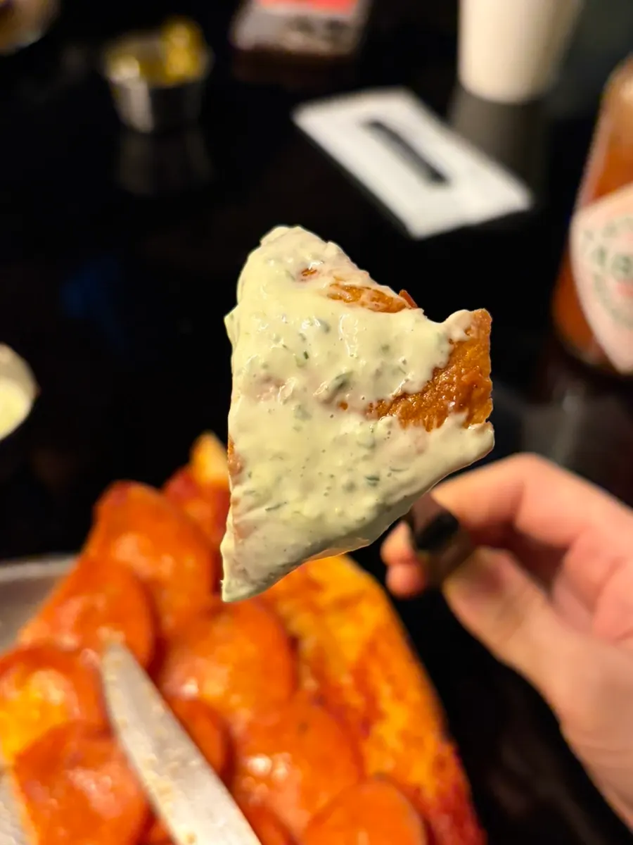 Pizza dipped in house-made cheongyang mayo sauce