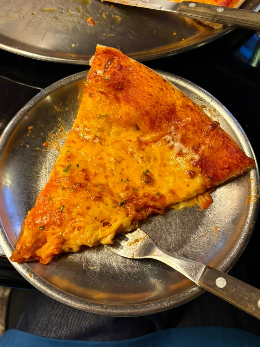 Close-up of pizza piled high with cheese