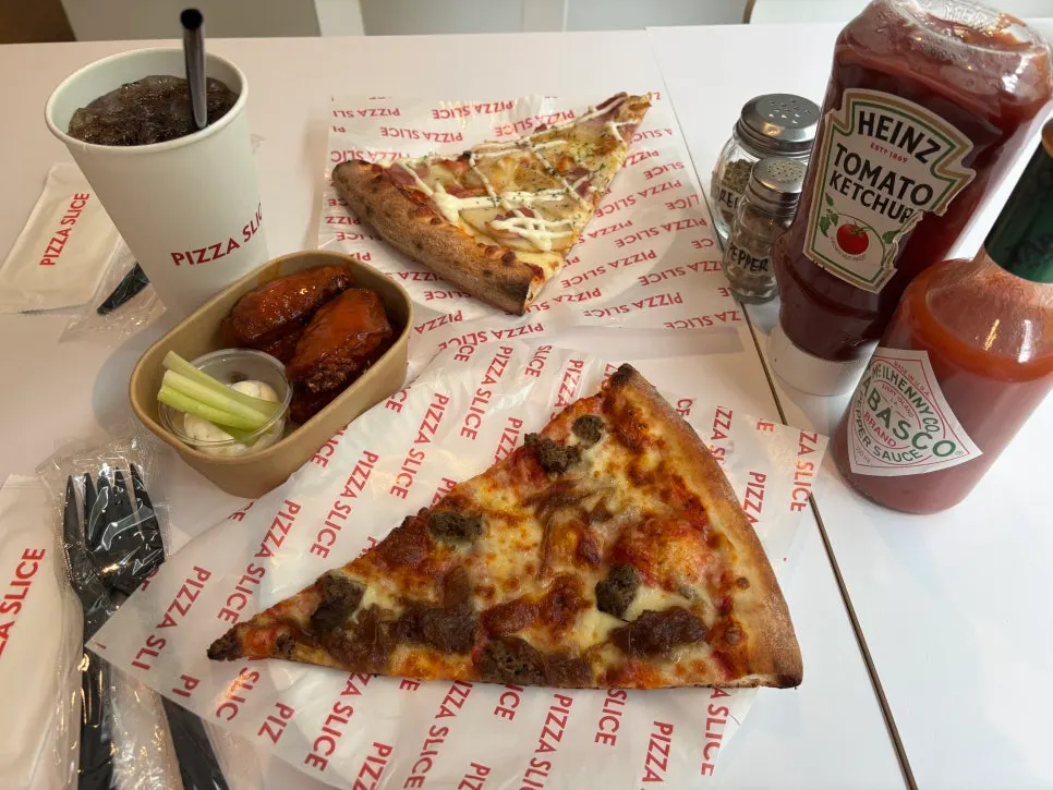Self-serve sauce station with hot sauce and oregano