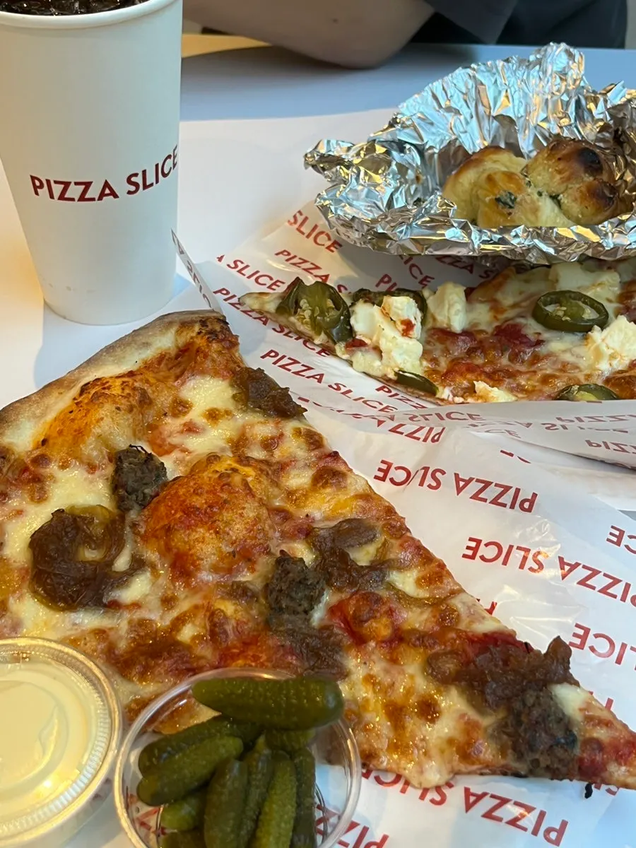 A plate of freshly served pizza slices