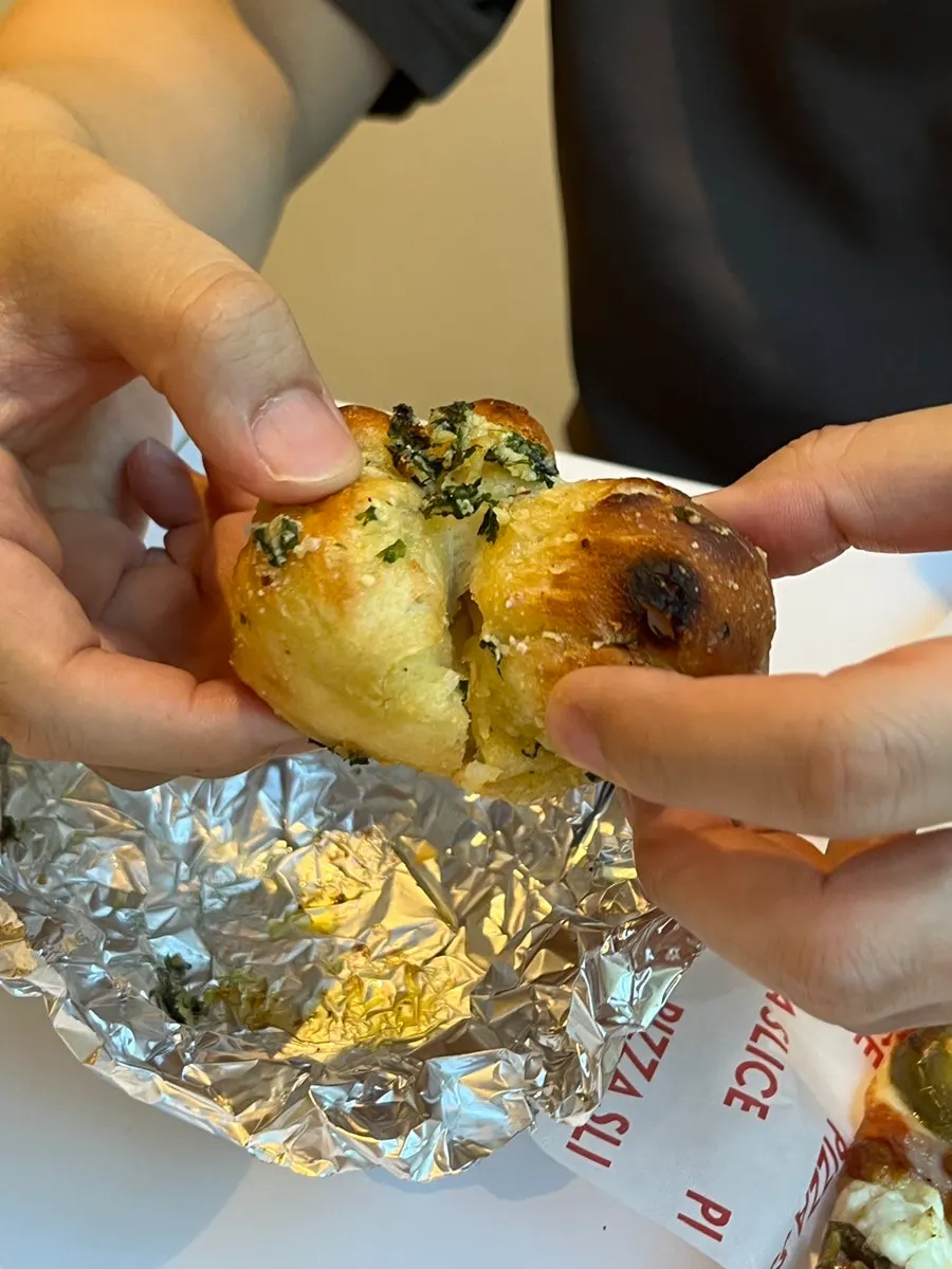 Cross-section of crispy baked garlic bread