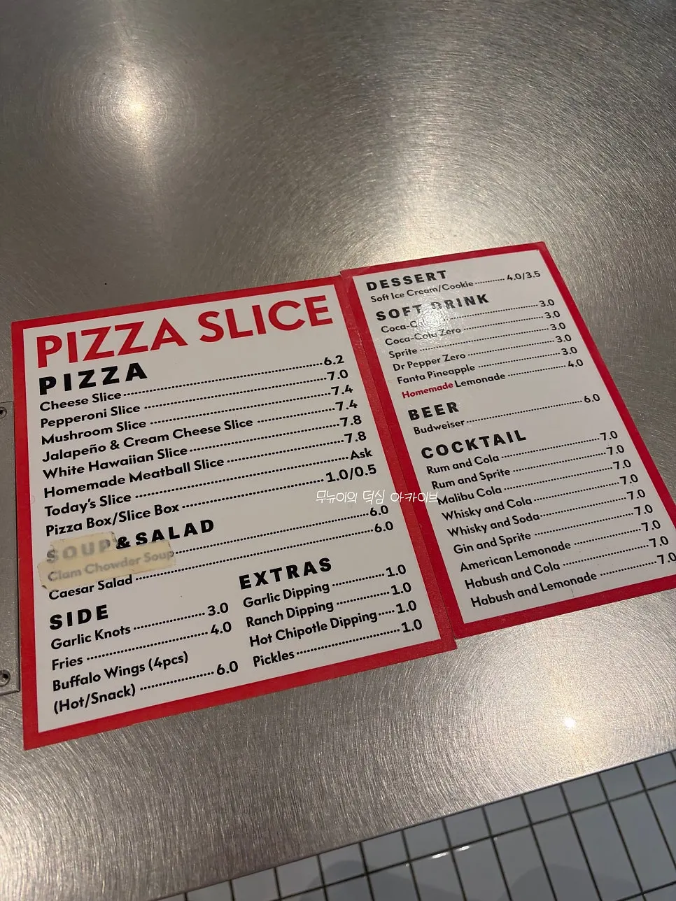 Pizza Slice Seoul menu board with prices