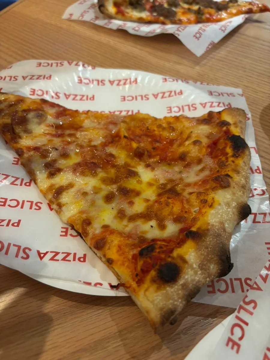 White Hawaiian pizza topped with pineapple and bacon
