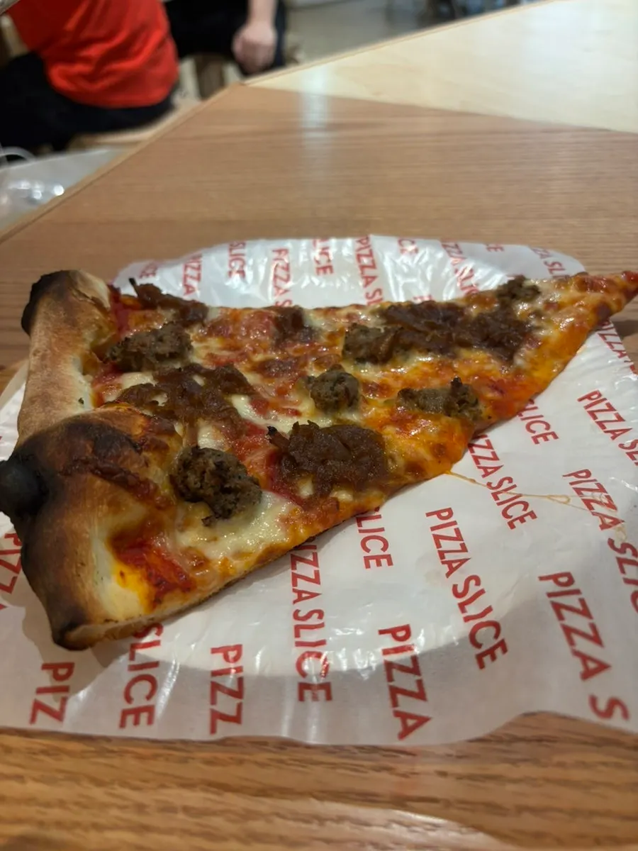 Thin-crust cheese slice pizza