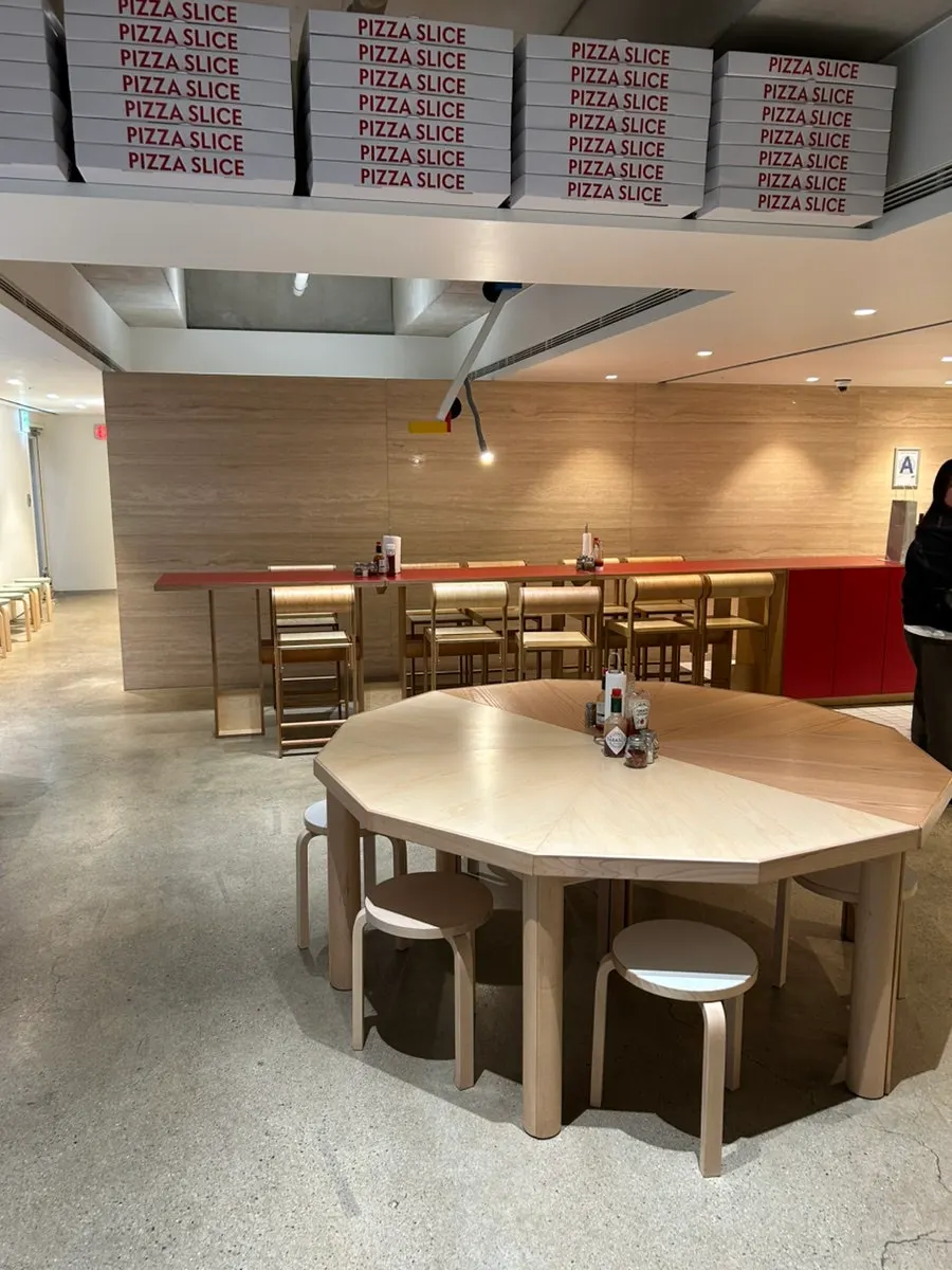 The spacious, bright interior of Pizza Slice Seoul