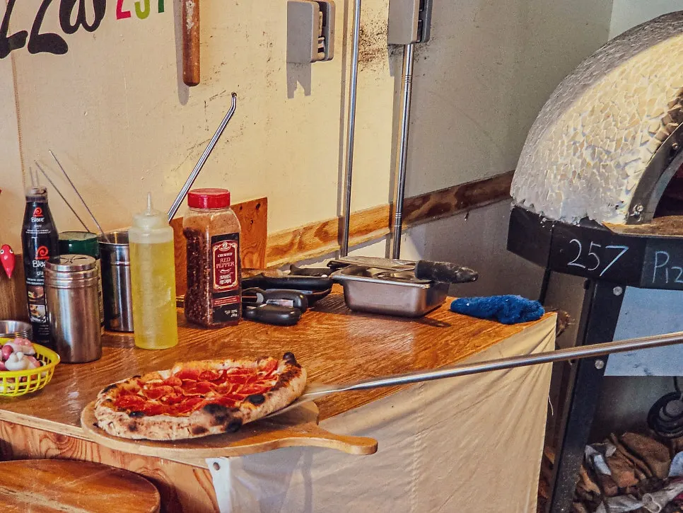 Stretching the pizza dough during preparation