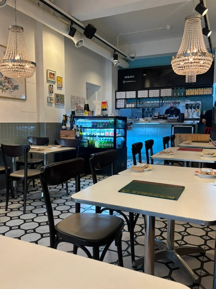 Interior seating at Pizzeria O Hapjeong Station