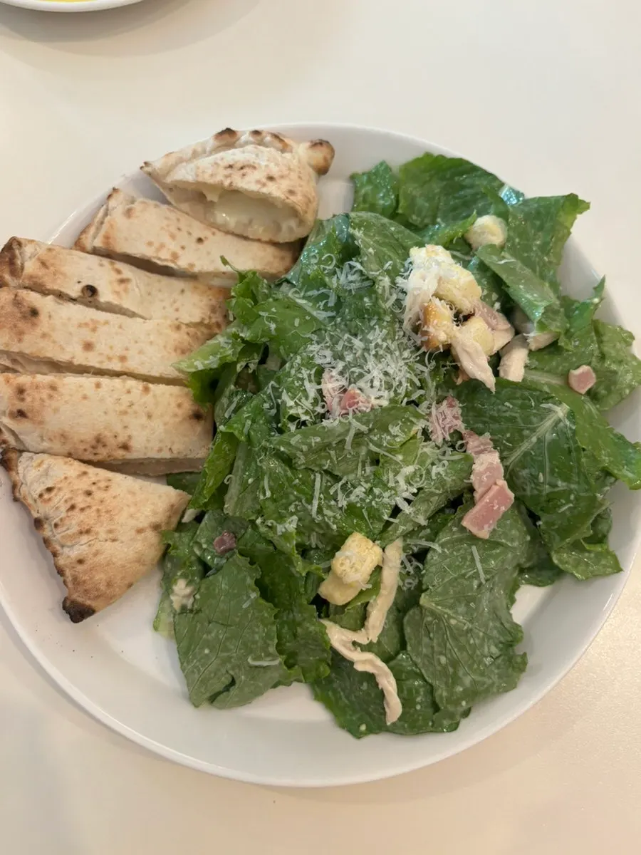 Caesar salad served as an appetizer