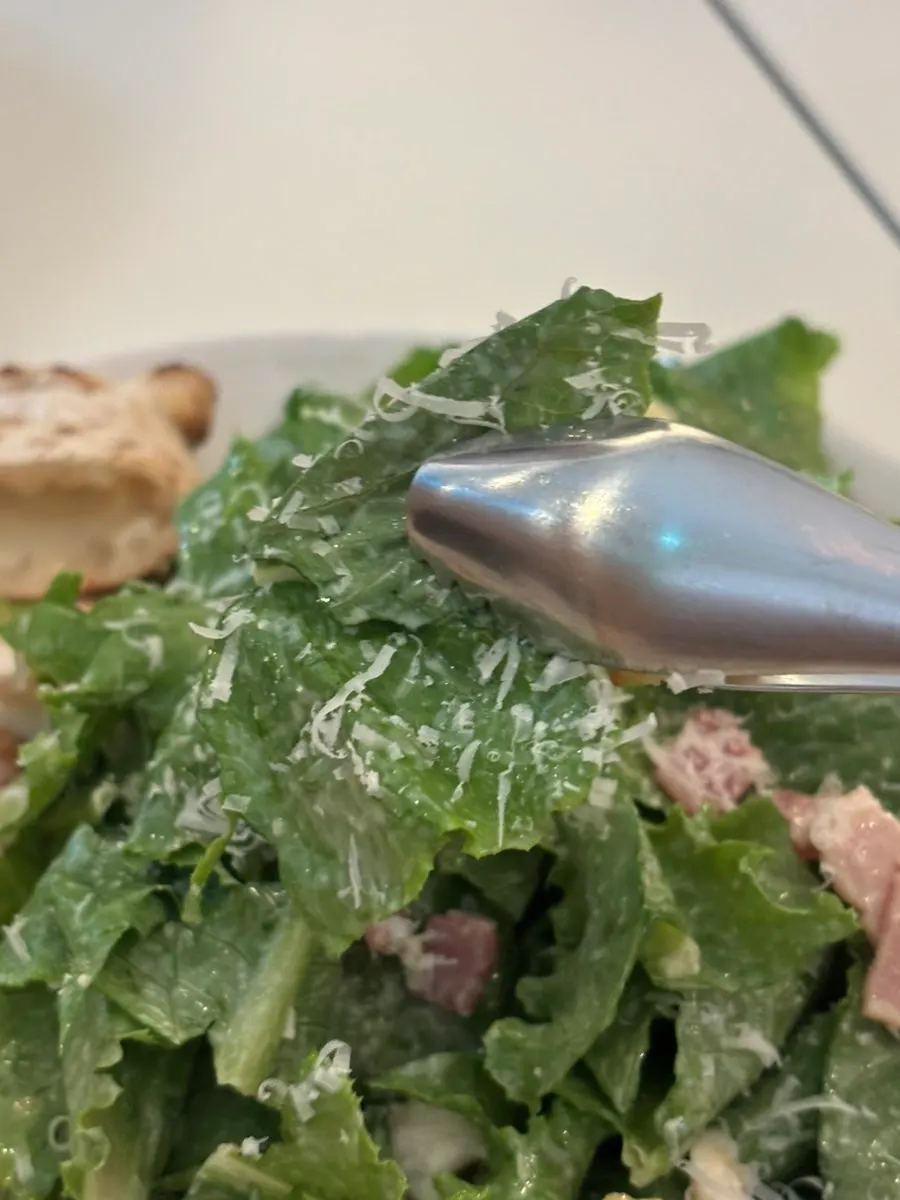 Caesar salad with chunky bacon pieces