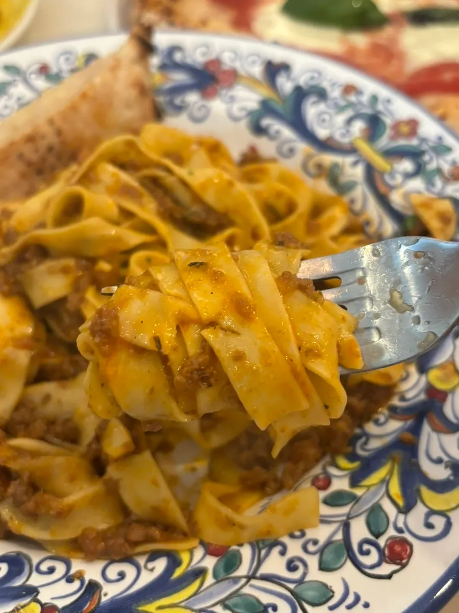 Ragu pasta noodles lifted with a fork