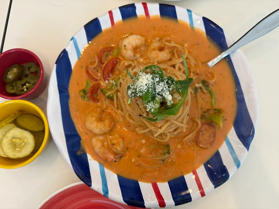 Plate of pasta with a generous amount of rosé sauce